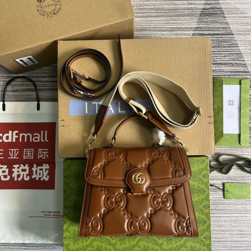 G*u*i top handle bags